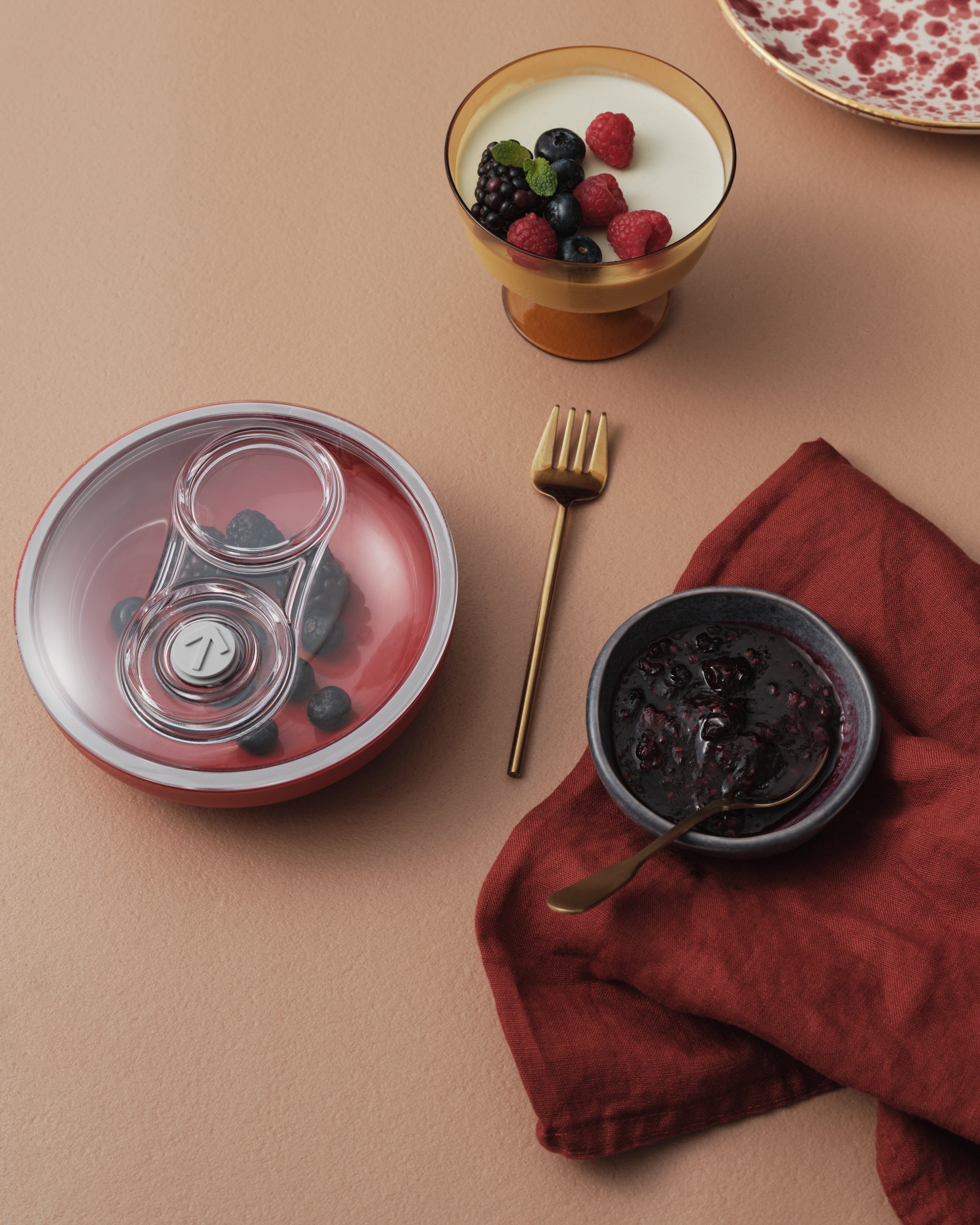 mint-infused pannacotta with berry sauce.